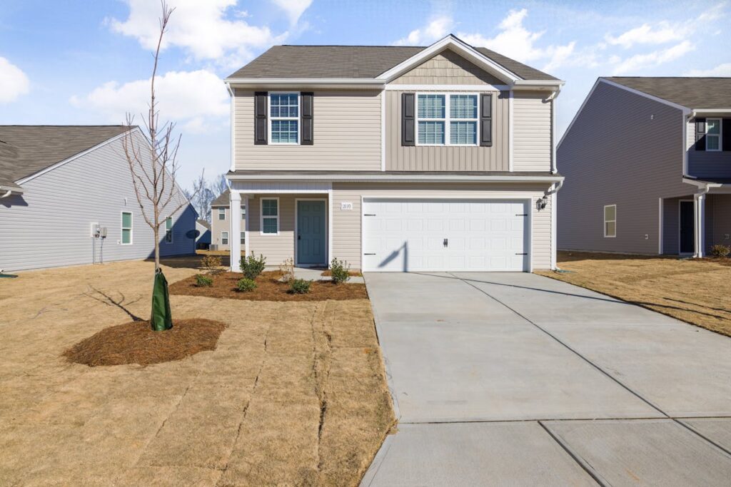 Concrete driveway slab installation Red Deer Alberta — 6-inch reinforced pour by Gilbert Concrete